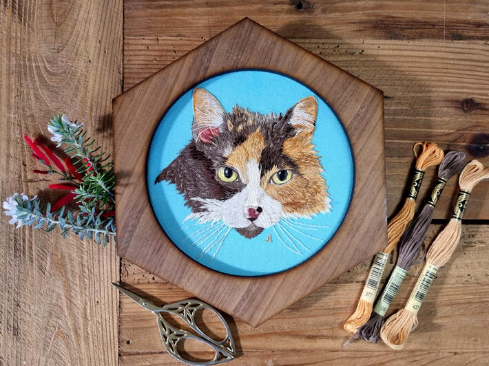 Hand embroidered calico long haired cat